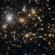 Illustration for article titled These Are Some of the Most Ancient and Distant Galaxies Ever Discovered—And They're Glorious